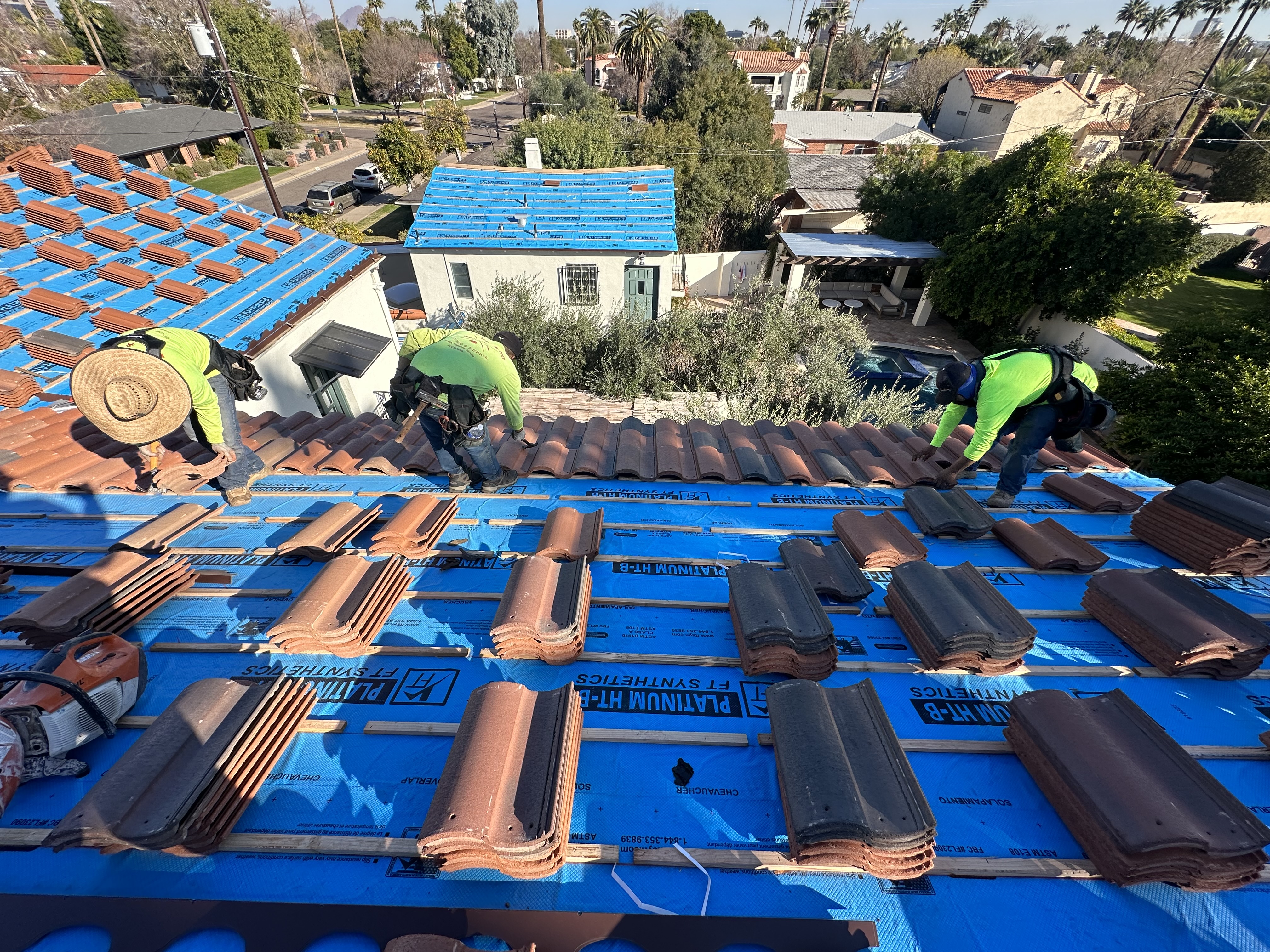 Fairway Construction LLC owner and crew at work on a Phoenix roof